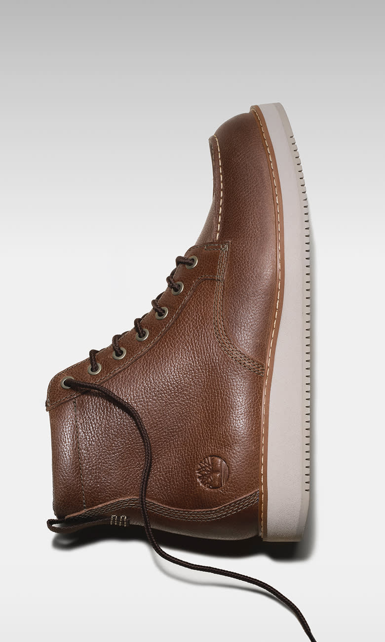 brown leather boot with untied shoelaces