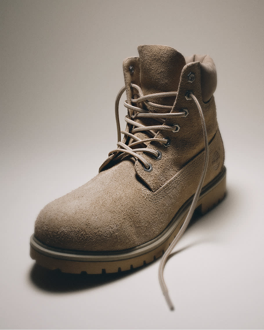 gray suede boot with untied laces