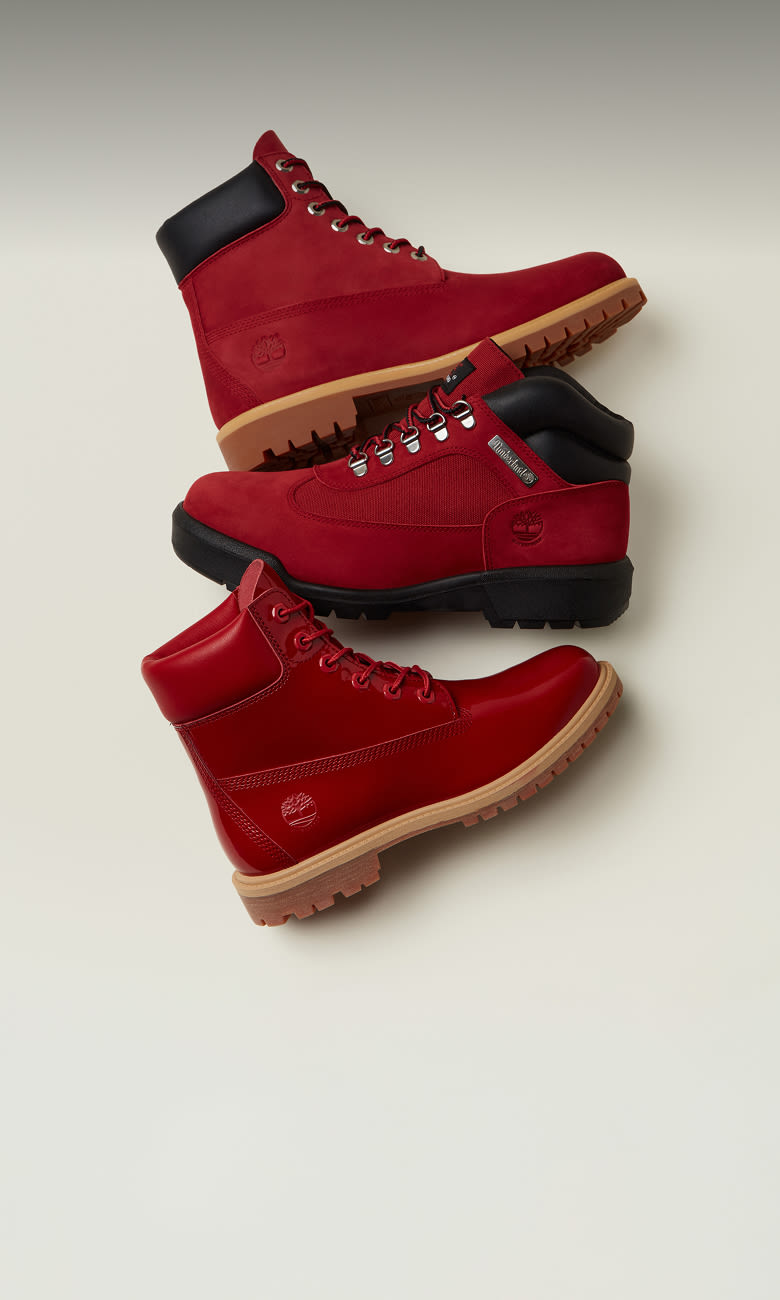 Image of 3 red Timberland boots on a white background
