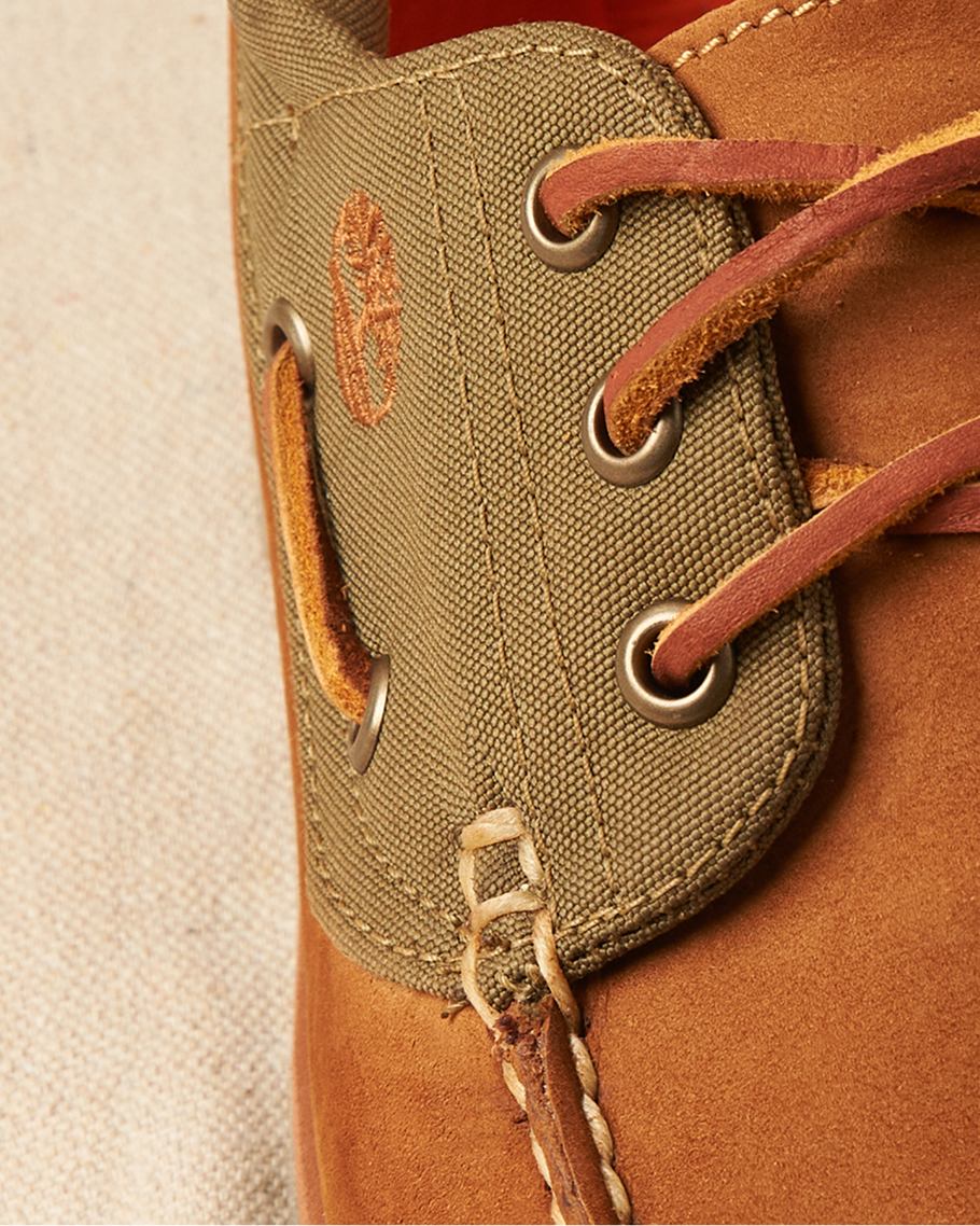 closeup details of the laces on a timberland boot