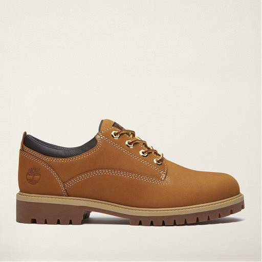 Wheat nubuck leather oxford shoe with tan laces, stitched detailing, and a tan lug sole.