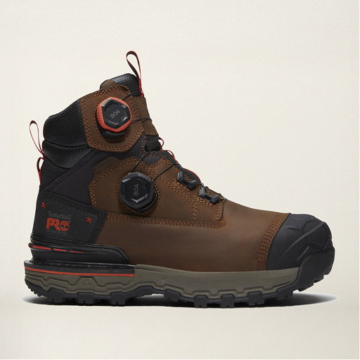 Brown leather Timberland PRO work boot with two orange BOA dial closures, black toe cap, and rugged lug outsole.
