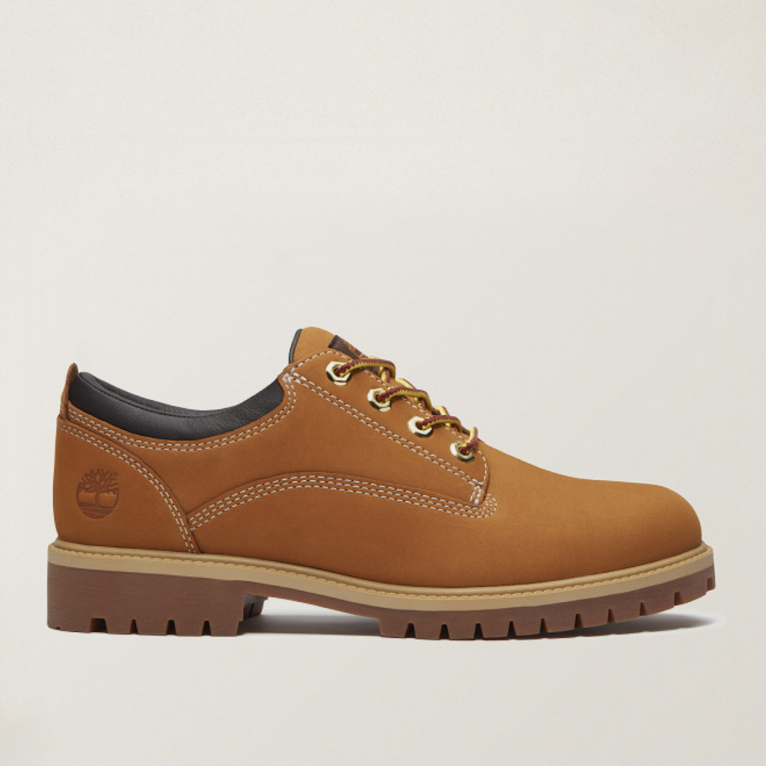 Wheat nubuck leather oxford shoe with tan laces, stitched detailing, and a tan lug sole.