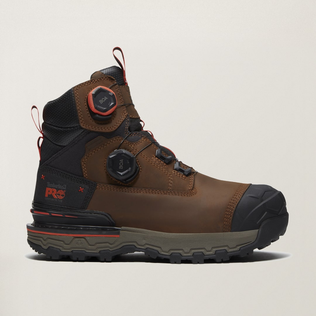 Timberland PRO brown leather work boot with pull tab, BOA dials and lugged outsole, side profile view.