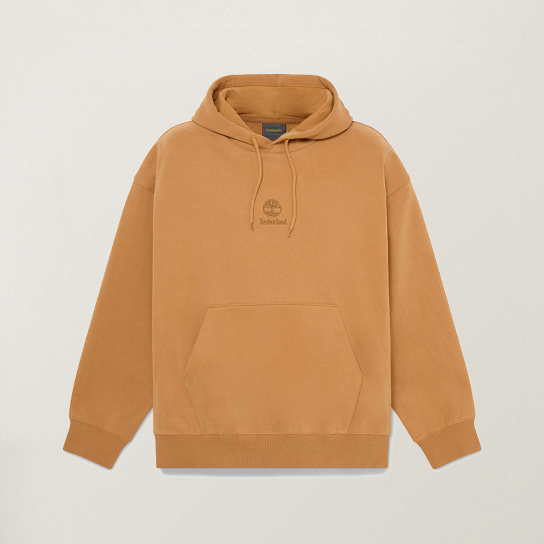 Camel-tan pullover hoodie with drawstring hood, kangaroo pocket, and embroidered Timberland tree logo on the chest.