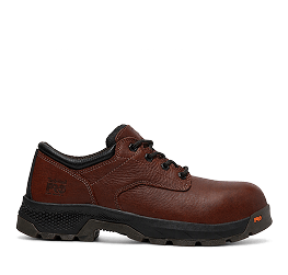 A brown leather work shoe with a black sole.