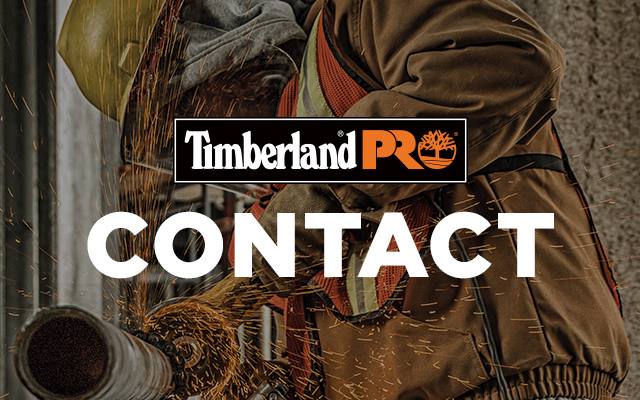 Iron worker wearing Timberland PRO and cutting a pipe with a grinder tool