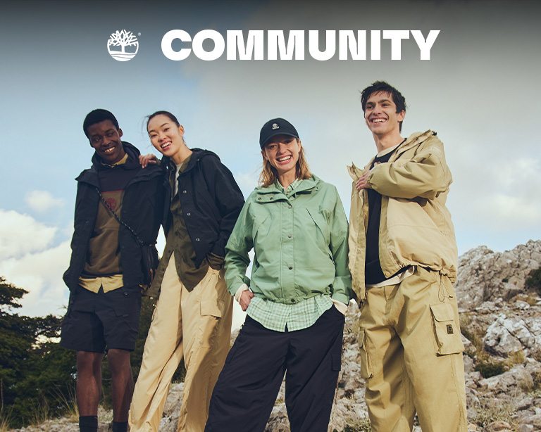 Timberland® Community - a man and women wearing Timberland® clothing and accessories sitting on a car hood.