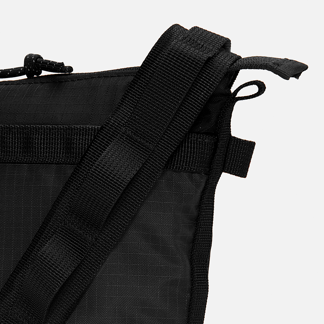 Cross body bag webbing strap outlet